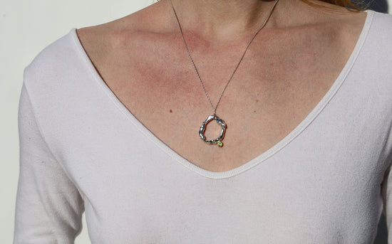Abstract Orb Peridot Necklace